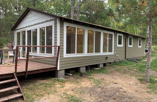 Menahga Cabin | Waterfront Cottage, swim, paddle, fish and relax on your private dock.