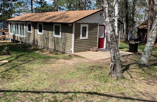 Menahga Cabin | Waterfront Cottage, swim, paddle, fish and relax on your private dock.