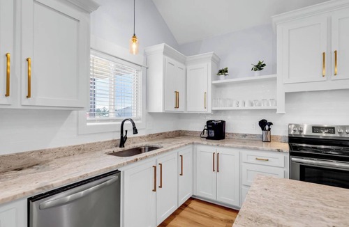 Shoreline Park House | Waterfront Escape in Bay STL with dock,pickleball, ping pong, basketball & more!