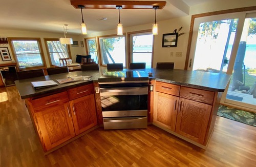 Sturgeon Bay House | Waterfront gem, sandy beach, modern kitchen, large great room, free firewood
