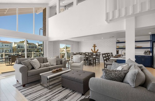 Channel Islands House | Waterfront home with kayaks, grill, Pac-Man, AC, balconies, & smart TVs