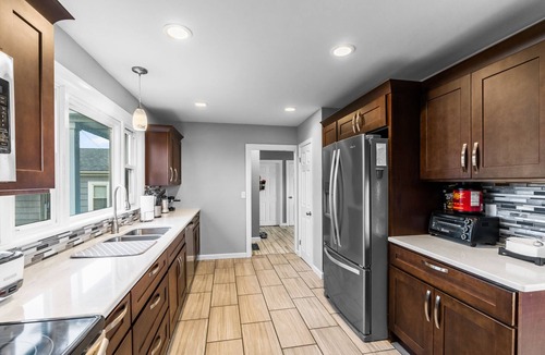 Fairhaven House | Waterfront Oasis with day beds and hot tub with captivating sunsets.