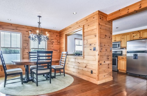 Manitowish Waters Condo | Waterfront resort condo with private dock, 4-season porch, & seasonal pool