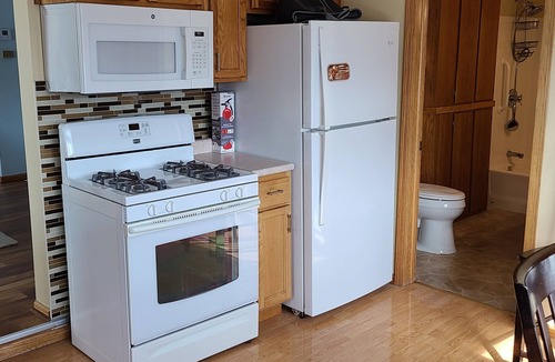 Algoma House | Waterfront, Serene 4-Bedroom House on Ahnapee River with Boat Dock/Slip