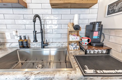 Algoma Apartment | Welcome to The Steele Magnolia! Completely renovated 2 bed/1ba which includes 1 queen and 1 twin XL bunk bed. We are located directly across the street from Von Stiehl Winery and are just a few minutes walk to Crescent Beach!