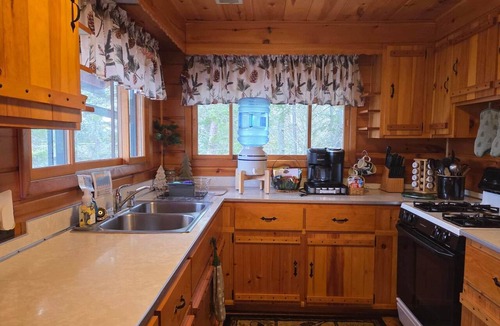 Cook Cabin | Wolfe's Den Cabin | Angler Extras + Lake Toy Fleet