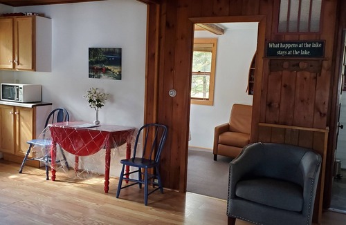 Eagle River Cottage | your own private beach Lakefront cozy cottage in a peaceful bay on 5 lake chain.