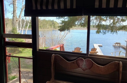 Eagle River Cottage | your own private beach Lakefront cozy cottage in a peaceful bay on 5 lake chain.