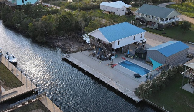 3 bedroom house, full size swimming pool and 100' of docked waterfront access.