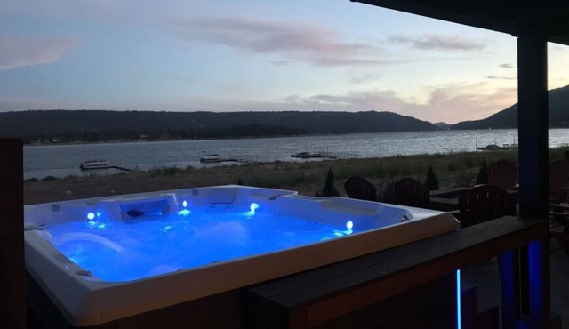 Beautiful lakefront home with guest house, dock, game room, hot tub