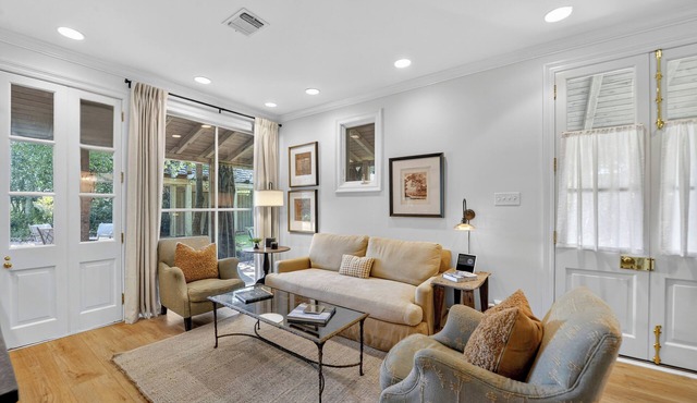 Beautiful two story cottage on a private, wooded street but close to everything!