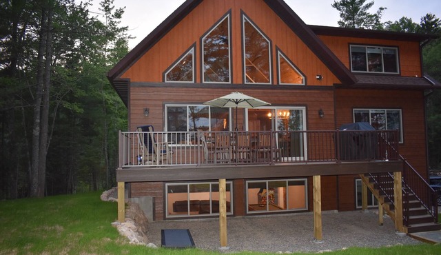 Custom 5 BR, 3.5 Bath Home Near Eagle River On Beautiful Upper Buckatabon Lake