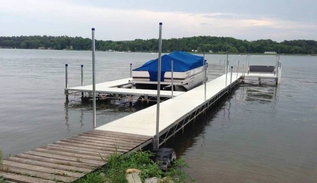 Lovely lakefront home-zero entry shoreline. Pontoon and snowmobile trail access.