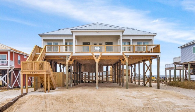 Luxurious 5/5 Waterfront Beach House on Dauphin Island's Sound Side featuring a