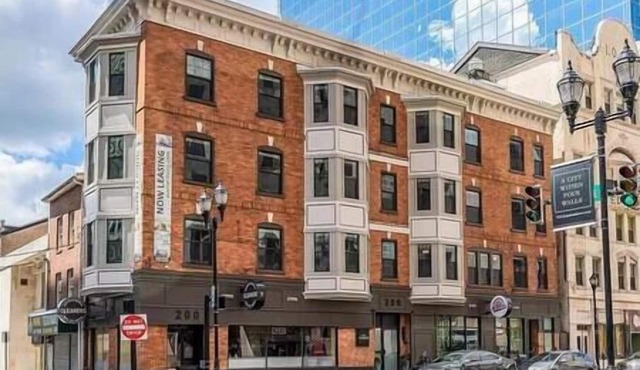 Modern Downtown 1BR | Free Garage Parking + Workspace