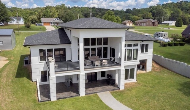 Modern Waterfront Mansion with Private Dock, kayak, paddle board and ping pong