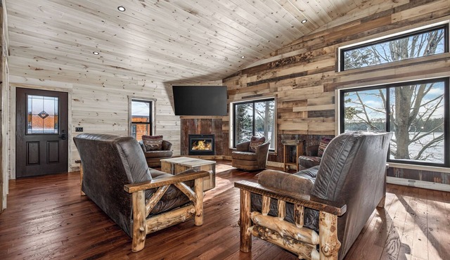 NEW BUILD! Lakefront resort cabin with fireplace, sandy beach, dock, fire pit!