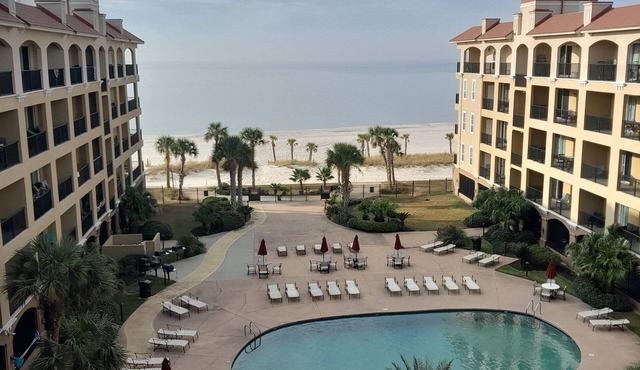 On the beach! Gated condo 2BR with a spectacular ocean view.