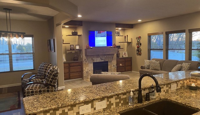 West Omaha home with pool/hot tub/arcade/table games. Two minutes from Dodge St.