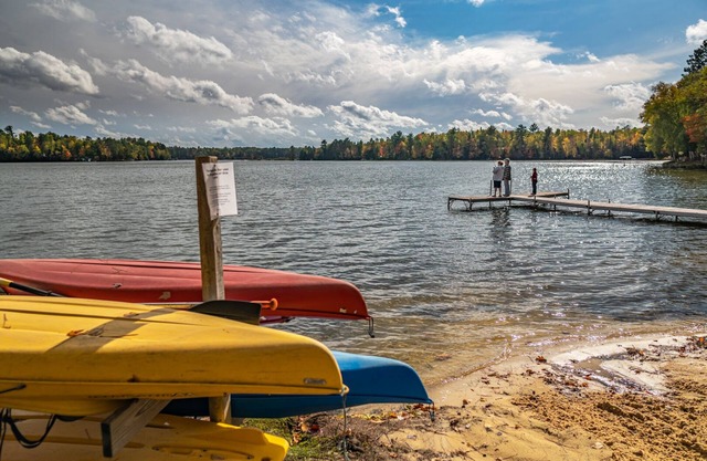 Adorable cottage in lakeside resort with beach and personal dock!