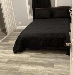 Queen Room with Shared Bathroom