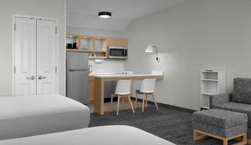 Queen Studio with Two Queen Beds and Sofa Bed