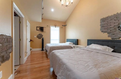 Maurepas House | House located on the Bayou-Sleeps 16. Fishing, WiFi, pool, AC, and pool table